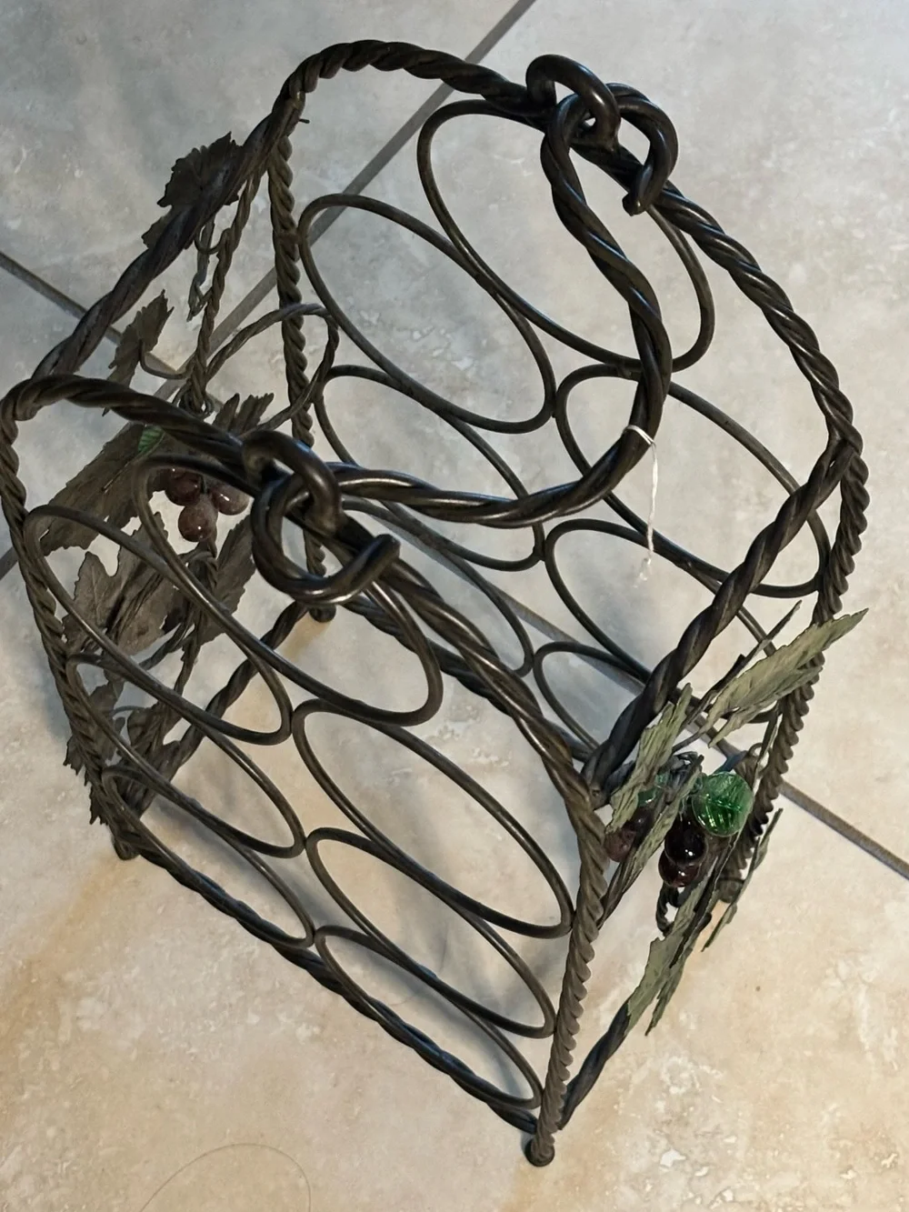 Black Metal Wine Bottle Rack with Decorative Leaf Accents
